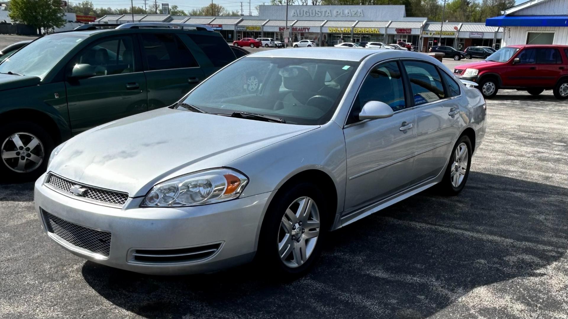 2013 Silver Chevrolet Impala LT (2G1WB5E3XD1) with an 3.6L V6 DOHC 16V FFV engine, 6-Speed Automatic transmission, located at 2710A Westlane Rd., Indianapolis, IN, 46268, (317) 291-2000, 39.885670, -86.208160 - Photo#3